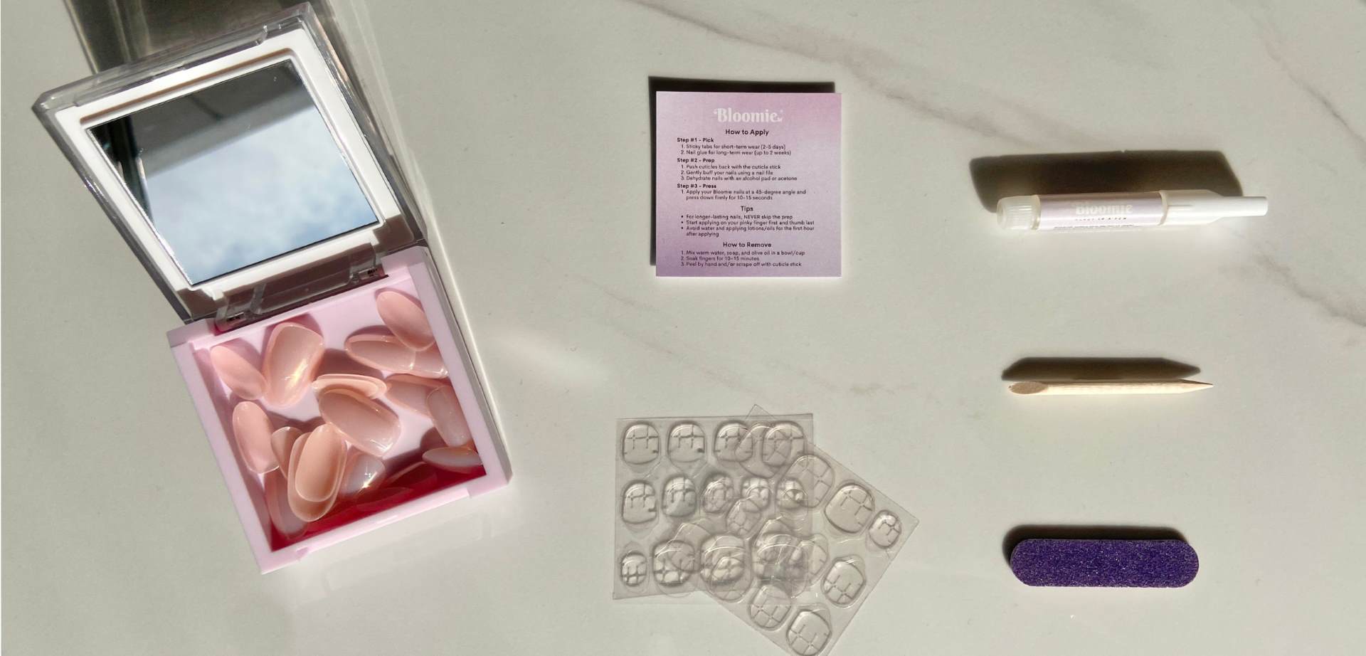what is included in a bloomie press on nail kit