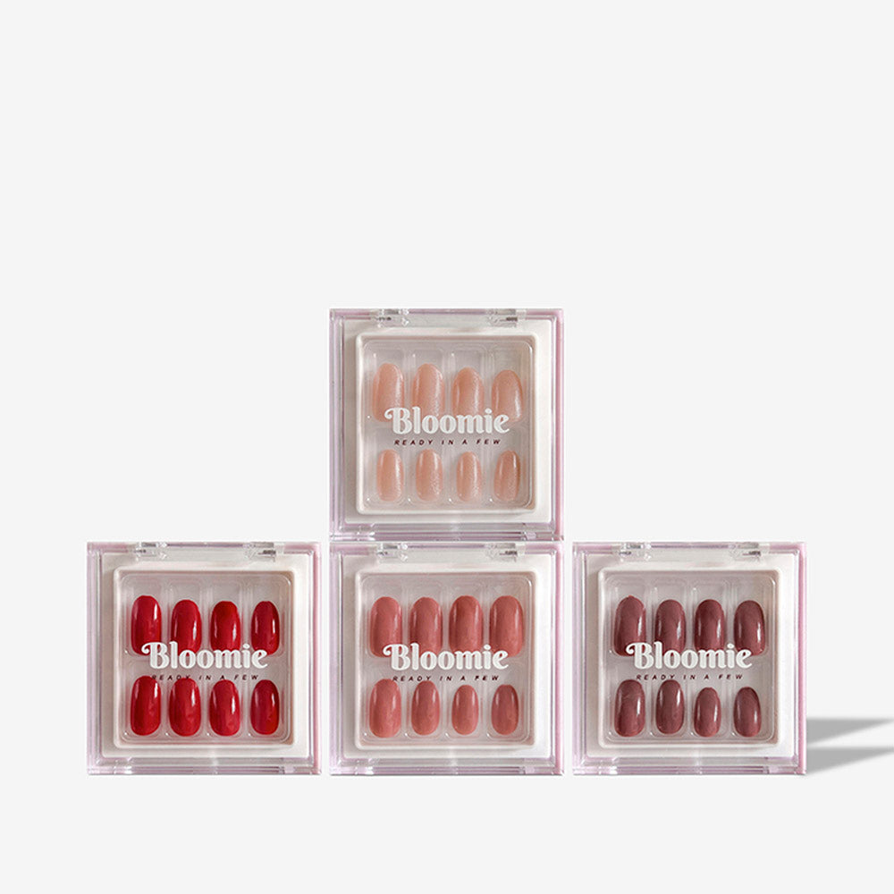 four sets of bloomie beauty press on nails in short length