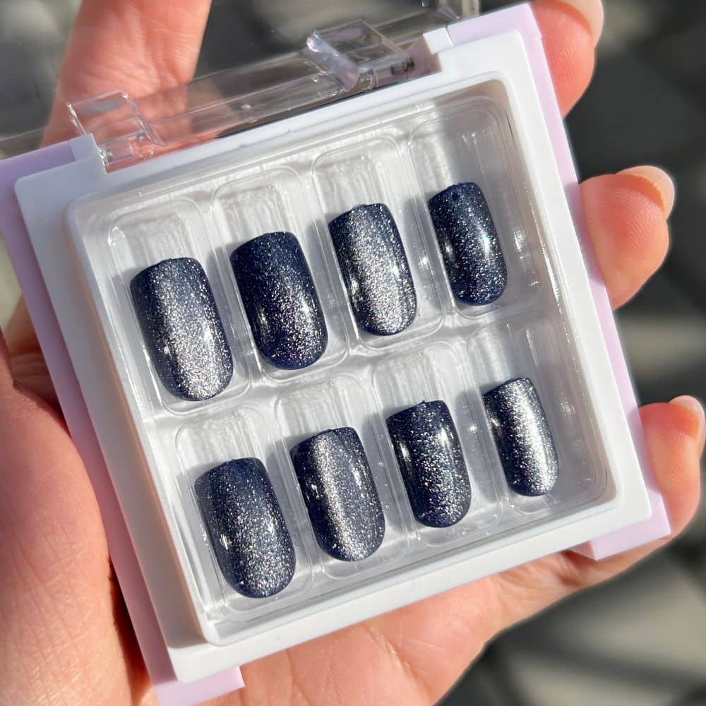 dark navy blue cateye press on nails in short length with square shape and glittery finish