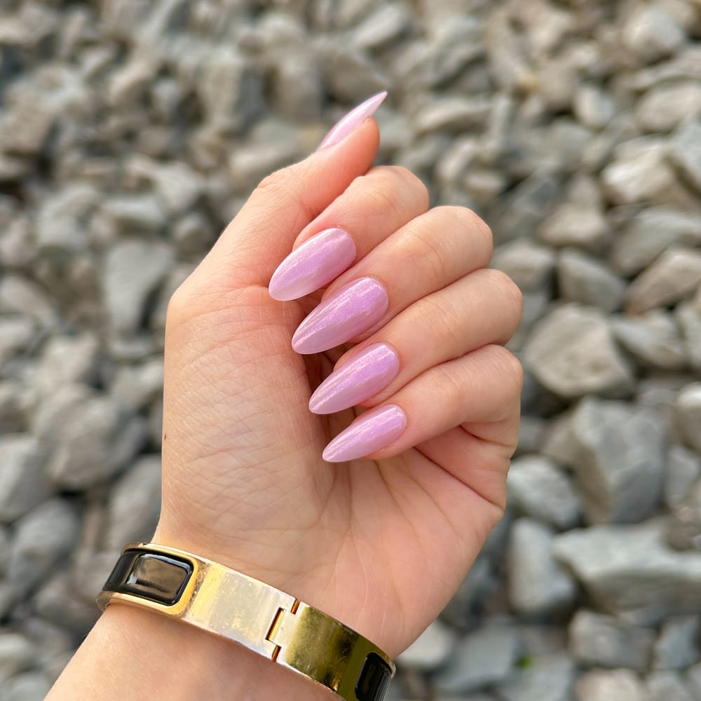 pink press on nails on hand